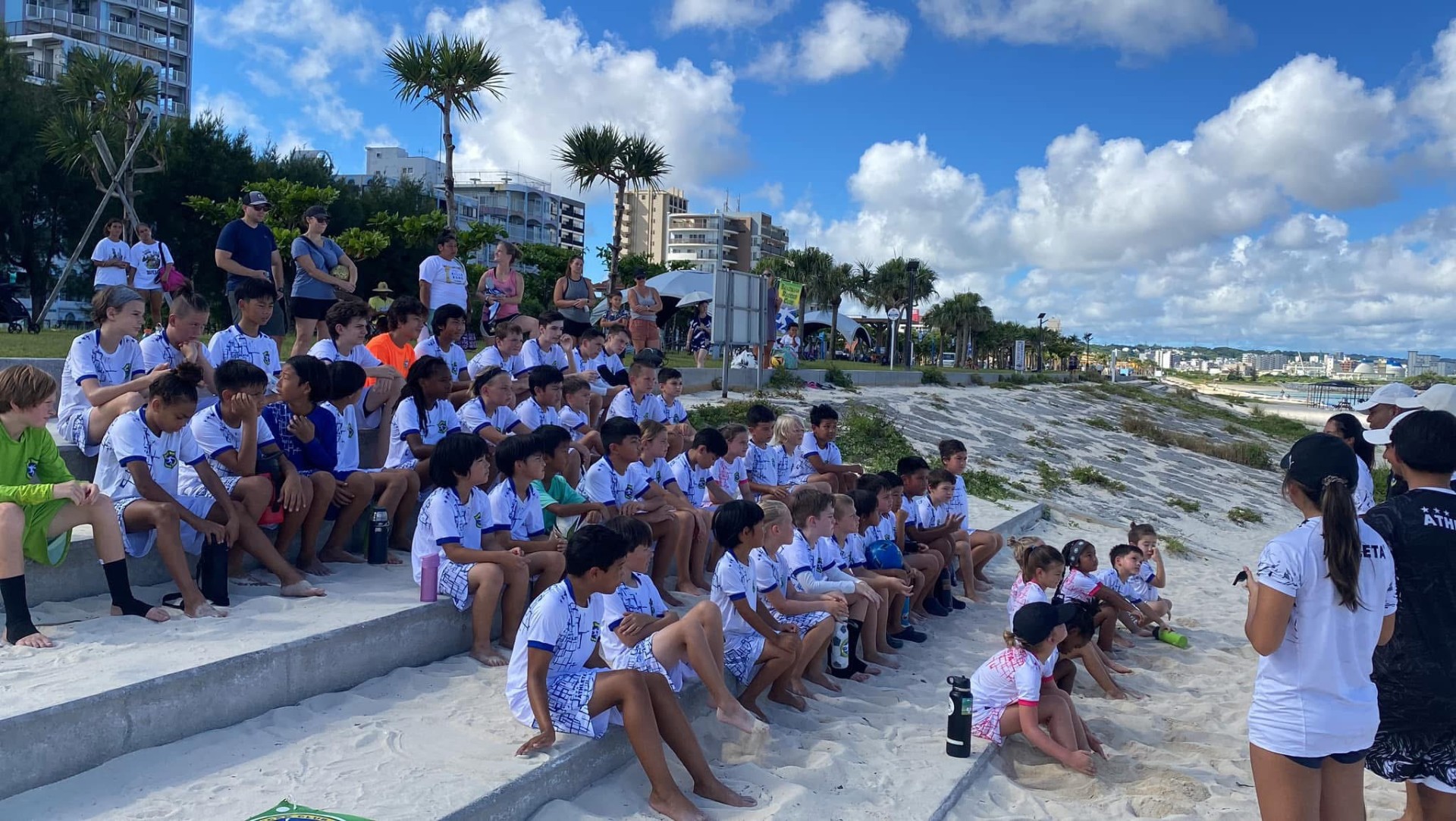 BSC Summer Camp 2023 — campers and coaches gathered on the beach steps